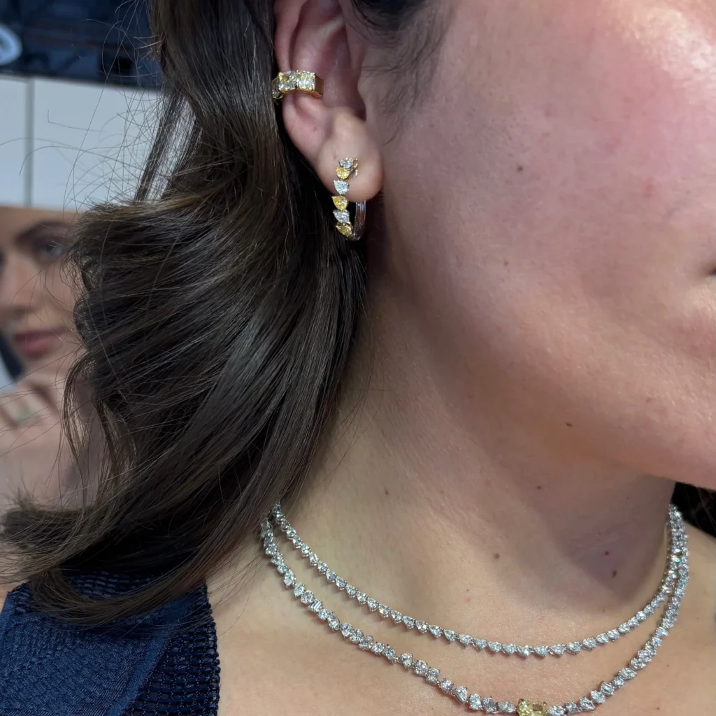 Alternative view of Yellow and White Pear Diamond Mini Hoop Earrings