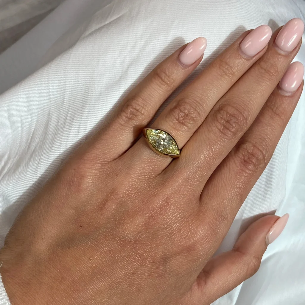 Fancy Yellow Marquise Cut East West Bezel Set Diamond Ring - Image 6