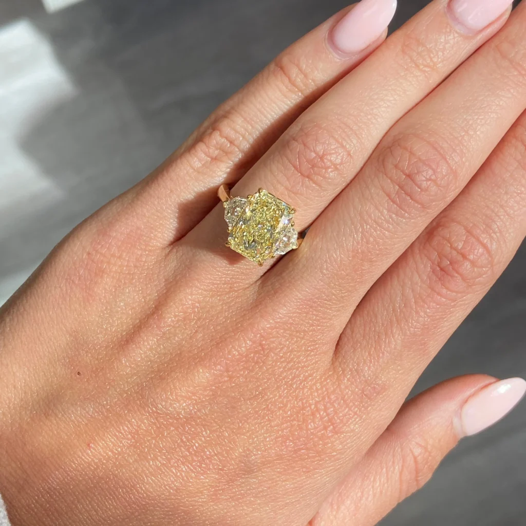 Alternative view of 6.03ct Light Yellow Elongated Radiant Diamond Three Stone Ring