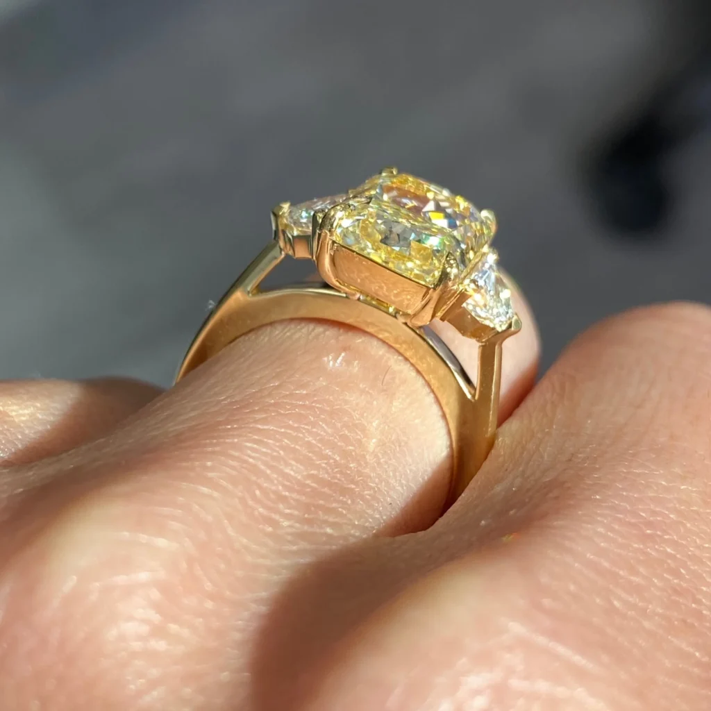 6.03ct Light Yellow Elongated Radiant Diamond Three Stone Ring - Image 4